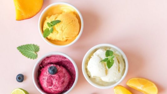 a bowl of fruit on a plate