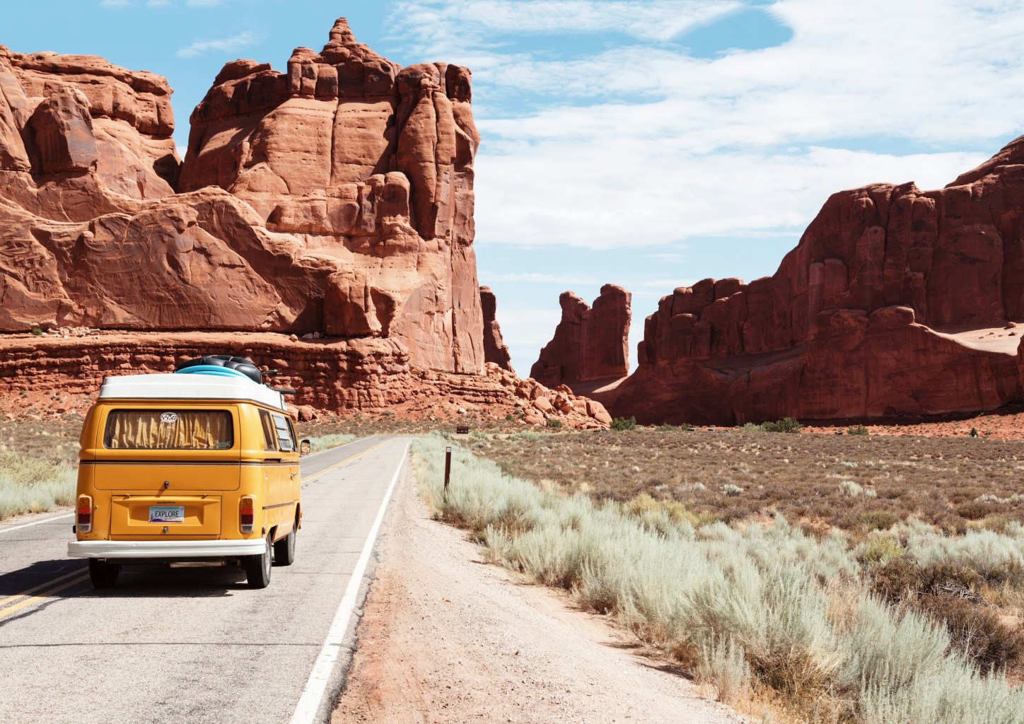 a bus that is parked on the side of Arches National Park