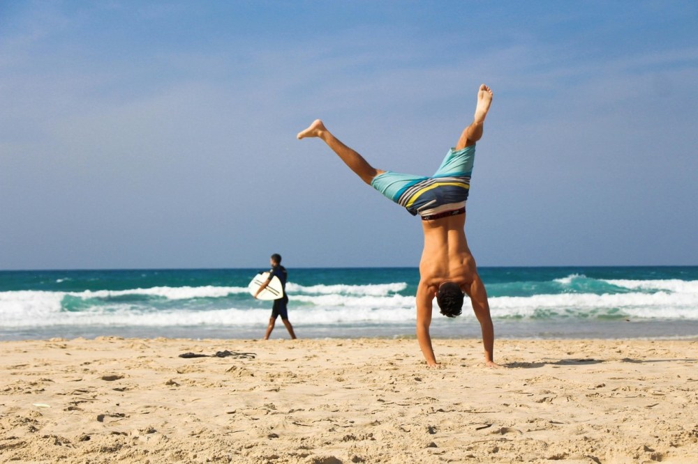 a person walking on a beach